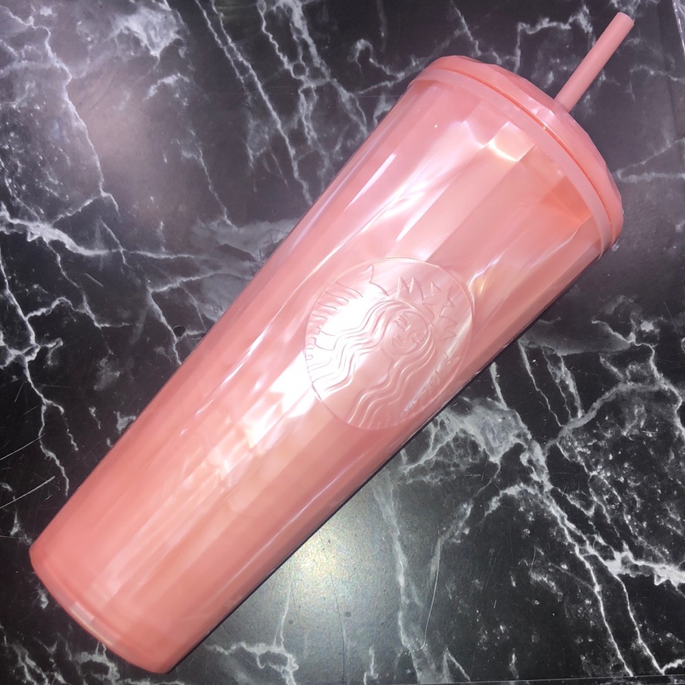 Pink / peach Starbucks tumbler